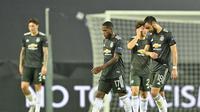 Para pemain Manchester United tertunduk lesu usai dikalahkan Sevilla pada semifinal Liga Europa 2019/2020, Senin (17/8/2020). (AP Photo/Martin Meissner, Pool)