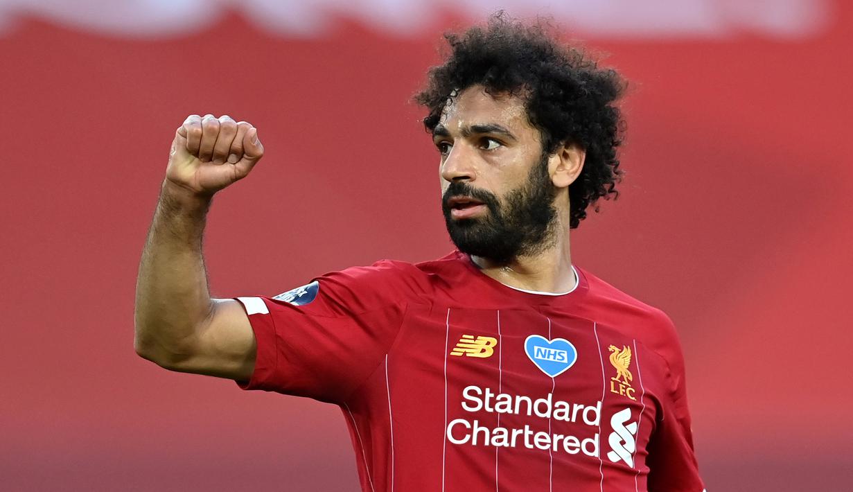 1. Mohamed Salah (Liverpool) - Mohamed Salah, sangat ahli meneror pemain belakang lawan dengan kecepatan, dribel yang taktis dan penyelesaian akhir yang brilian. Hanya selama tiga musim bersama The Reds, dia membukukan 91 gol dan 27 assist dalam 144 penampilan. (AFP/paul Ellis/pool)