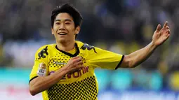 2. Shinji Kagawa - Pemain asal Jepang itu menjelma menjadi pemain bintang saat berseragam Borussia Dortmund. Kagawa berhasil membawa Dortmund meraih gelar Bundesliga dua kali beruntun yaitu pada musim 2010-2011 dan 2011-2012. (AFP/Patrik Stollarz)