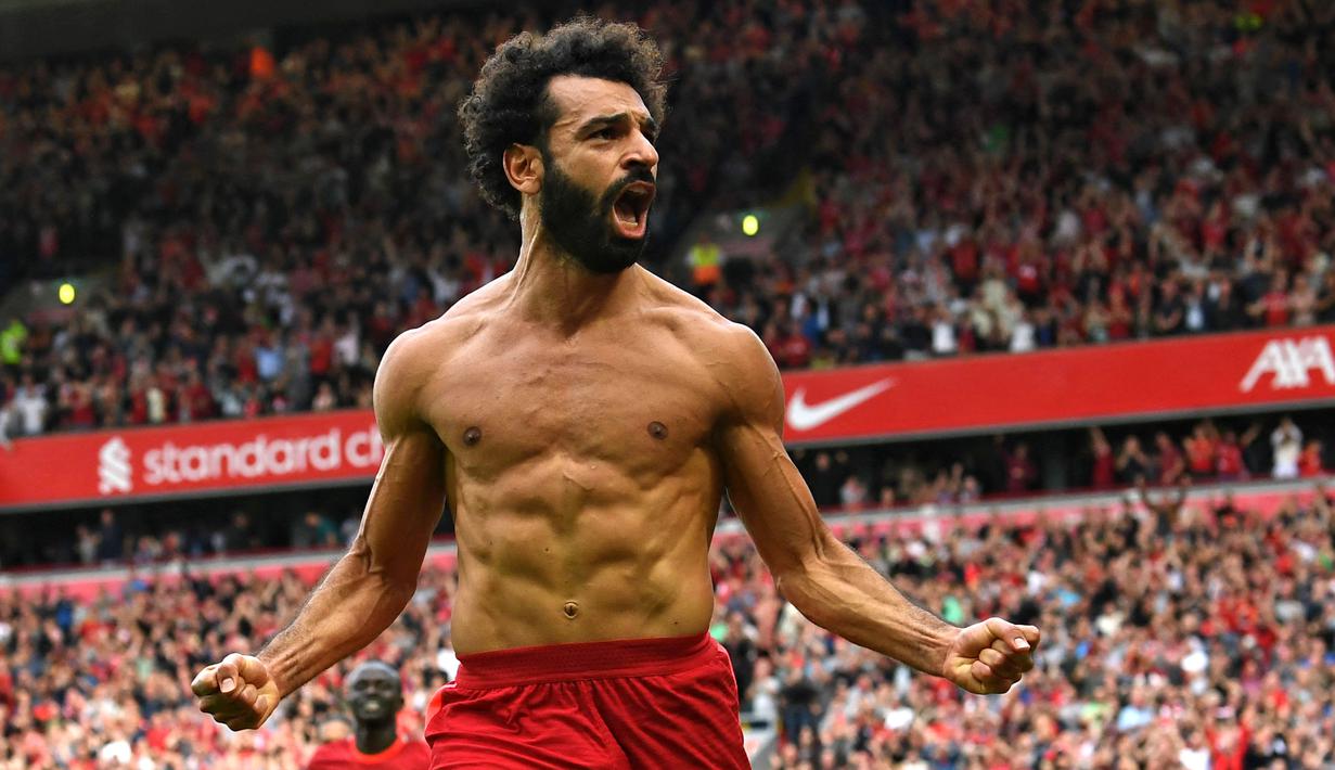 Satu gol ke gawang Watford pada Sabtu, (16/10/2021), membuat Mohamed Salah dinobatkan sebagai pemain Afrika tertajam di Liga Inggris bersanding dengan Didier Drogba. Bedanya, Salah mampu mencetak 104 dalam 166 laga sedangkan Droba meraih jumlah gol tersebut dalam 254 pertandingan. (AFP/Paul Ellis)