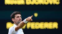 Ekspresi petenis Serbia, Novak Djokovic, setelah mengalahkan Roger Federer, pada final Wimbledon 2019, Minggu (14/7/2019). (AFP/Daniel Leal-Olivas)