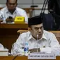 Menteri Agama Fachrul Razi saat Rapat Kerja dengan Komisi VIII DPR di Jakarta, Selasa (8/9/2020). Fachrul Razi menyatakan tidak tahu jika pernyataannya soal radikalisme masuk masjid melalui anak muda yang menguasai bahasa Arab dan good looking akan menjadi konsumsi publik. (Liputan6.com/Johan Tallo)