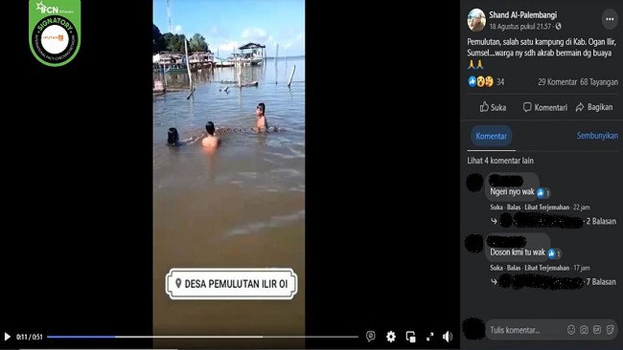 Gambar Tangkapan Layar Video yang Diklaim Anak-anak Berenang dengan Buaya (sumber: Facebook).