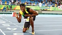 Sprinter Jamaika, Usain Bolt, merebut emas ketiga di Olimpiade Rio seusai memimpin rekan-rekannya memenangi nomor estafet 4 x 100 meter putra, Jumat (19/8/2016) waktu setempat atau Sabtu (20/8/2016) WIB. (EPA/Diego Azubel)