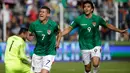 Pemain Bolivia, Juan Carlos Arce (7) merayakan golnya ke gawang Argentina dalam laga Kualifikasi Piala Dunia zona Amerika Selatan di Stadion Hernando Siles, Rabu (29/3). Tanpa Lionel Messi, Argentina kalah 0-2 dari Bolivia. (AP Photo/Victor R. Caivano)