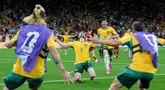 Pemain Australia merayakan kemenangan atas Turki pada laga matchday 1 Grup D Piala Dunia 2026 di BC Place, Vancouver, Kanada, Minggu (14/6/2026) siang WIB. (AP Photo/Abbie Parr)