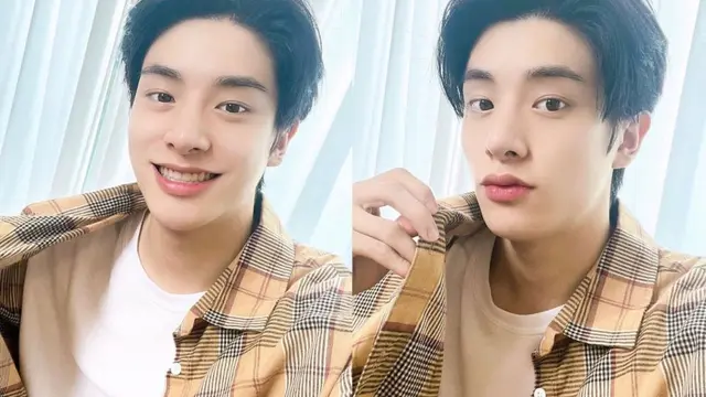 Jake ENHYPEN dalam busana putih