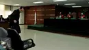 Suryadharma Ali (SDA) bersiap menjalani sidang di Pengadilan Tipikor, Jakarta, Senin (14/9). JPU KPK menolak keberatan yang diajukan SDA pada eksepsi yang dibacakan pekan lalu terkait korupsi penyelenggaraan ibadah haji. (Liputan6.com/Andrian M Tunay)