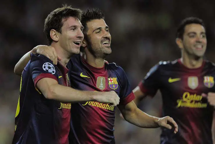 Lionel Messi (kiri) pada 2012/2013. (AFP/Josep Lago)