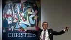 Proses lelang lukisan karya Pablo Picasso berjudul ‘Women of Algiers’ di Balai Lelang Christie, New York, Senin (11/5/2015). Lukisan tersebut terjual seharga 179,3 juta dolar AS atau sekitar Rp 2,36 triliun. (REUTERS/Carlo Allegri)