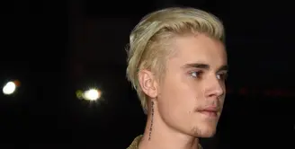 Kabar mengejutkan datang dari Justin Bieber, penyanyi asal Kanada ini memboyong pacar baru saat dirinya berlibur ke Jepang. (AFP/Bintang.com)