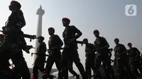 Prajurit TNI mengikuti Apel Gelar Pasukan Pengamanan KTT ASEAN di Silang Monas, Jakarta, Jumat (1/9/2023). (merdeka.com/Imam Buhori)