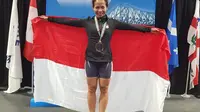 Srikandi wanita yang panggilan akrabnya, Sari, wanita kelahiran Pakpak, Dairi, Sumatera Utara,17 Juni 1971, berhasil menjuarai kejuaraan World Masters Weightlifting Championship 2019 di Montreal, Kanada untuk kategori kelas umur 45-49 tahun (Istimewa)