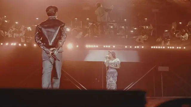 Krisdayanti dalam konser Afgan bertajuk retrospektif: The Concert di Jakarta, dengan menggandeng promotor Seven Star Production, Sabtu (18/7/2026). (Instagram/@afganretrospektifconcert)