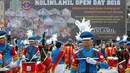 Atraksi Drum Band saat Open Day Kolinlamil di Tanjung Priok, Jakarta, Minggu (24/7). Open Day Kolinlamil diselenggarakan dalam rangka HUT KOLINLAMIL 1 Juli 2016 yang Ke-55. (Liputan6.com/Helmi Afandi)
