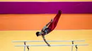 <p>Pesenam putra Indonesia, Satria Tri Wira Yudha beraksi dalam nomor palang sejajar Kejuaraan Dunia Gimnastik 2025 di Indonesia Arena, Senayan, Jakarta, Senin (20/10/2025). (Bola.com/Bagaskara Lazuardi)</p>
