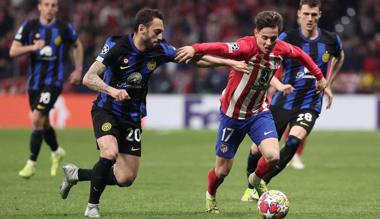 Gol Memphis Depay pada menit ke-87 membuat agrerat gol menjadi 2-2, laga antara Atletico Madrid dan Inter Milan harus berlanjut ke babak tambahan. (Thomas COEX/AFP)