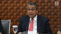 Gubernur BI Perry Warjiyo memberikan penjelasan kepada wartawan di Jakarta, Kamis (20/6/2019). RDG Bank Indonesia 19-20 Juni 2019 memutuskan untuk mempertahankan BI7DRR sebesar 6,00%, suku bunga Deposit Facility sebesar 5,25%, dan suku bunga Lending Facility sebesar 6,75%.(Liputan6.com/Angga Yuniar)