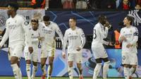 Pemain Real Madrid merayakan gol ke gawang Brest di Liga Champions, Kamis (30/1/2025) dini hari WIB. (c) AP Photo/Thibault Camus