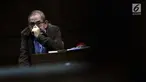Terdakwa kasus dugaan suap limbah sawit yang juga mantan Ketua Komisi B DPRD Provinsi Kalteng Borak Milton saat mengikuti sidang lanjutan di Pengadilan Tipikor, Jakarta, Rabu (8/5/2019). Sidang tersebut beragenda mendengar keterangan dua orang saksi (Liputan6.com/Helmi Fithriansyah)