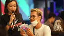 Tak hanya live music, para peserta nonton bareng juga dapat bermain games dan kuis persembahan dari Tri, jaringan hemat dan cepat. (Istimewa)