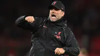 Jurgen Klopp - Pelatih yang sukses membawa Liverpool juara Liga Champions dan Liga Inggris ini resmi menjadi pelatih di The Reds pada Oktober 2015. Dari 334 laga yang dilakoni, Klopp telah meraih 202 kemenangan, 60 kekalahan dan 72 kali imbang. (AFP/Oli Scarff)