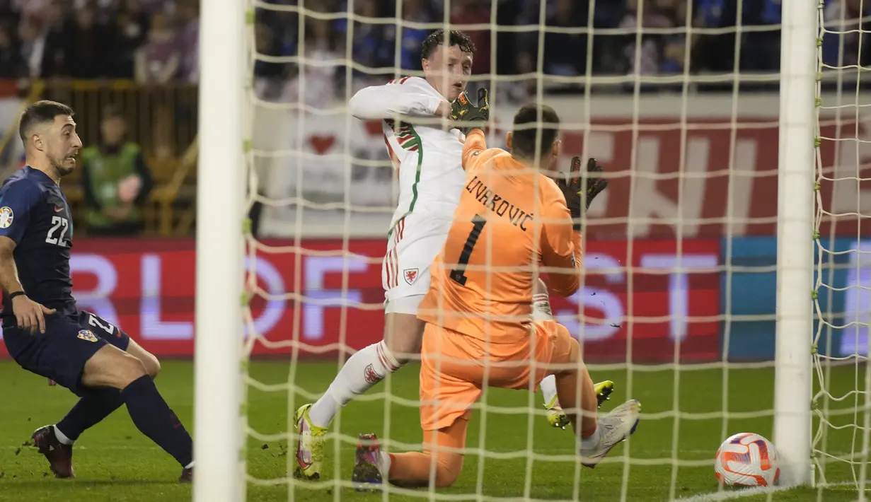 Kroasia sempat unggul 1-0 di babak pertama melalui Andrej Kramaric (28). (AP Photo/Darko Bandic)