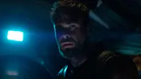 Aktor Chris Hemsworth saat beradegan dalam film Avengers Infinity War. Chris Hemsworth berperan sebagai Thor di film tersebut. (Marvel Studios via AP)