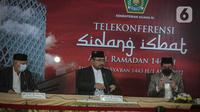 Menteri Agama Yaqut Cholil Qoumas (tengah) bersiap memberikan keterangan seusai sidang Isbat penentuan awal bulan Ramadhan di Kantor Kemenag Jakarta, Jumat (1/4/2022). Pemerintah menetapkan awal bulan Ramadhan 1443 H jatuh pada hari Minggu (3/4/2022). (Liputan6.com/Faizal Fanani)
