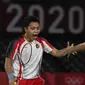 Reaksi ganda putri Indonesia Apriyani Rahayu (kiri) dan Greysia Polii saat melawan Chen Qing Chen dan Jia Yi Fan dari China pada final badminton ganda putri Olimpiade Tokyo 2020 di Musashino Forest Sport, Senin (2/8/2021). Greysia / Apriyani menang 21-19 dan 21-15. (Alexander NEMENOV/AFP)