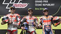 Pembalap Repsol Honda, Marc Marquez, masih menjadi memuncak klasemen sementara MotoGP 2018 diikuti Valentino Rossi dan Andrea Dovizioso. (AFP/Michal Cizek)