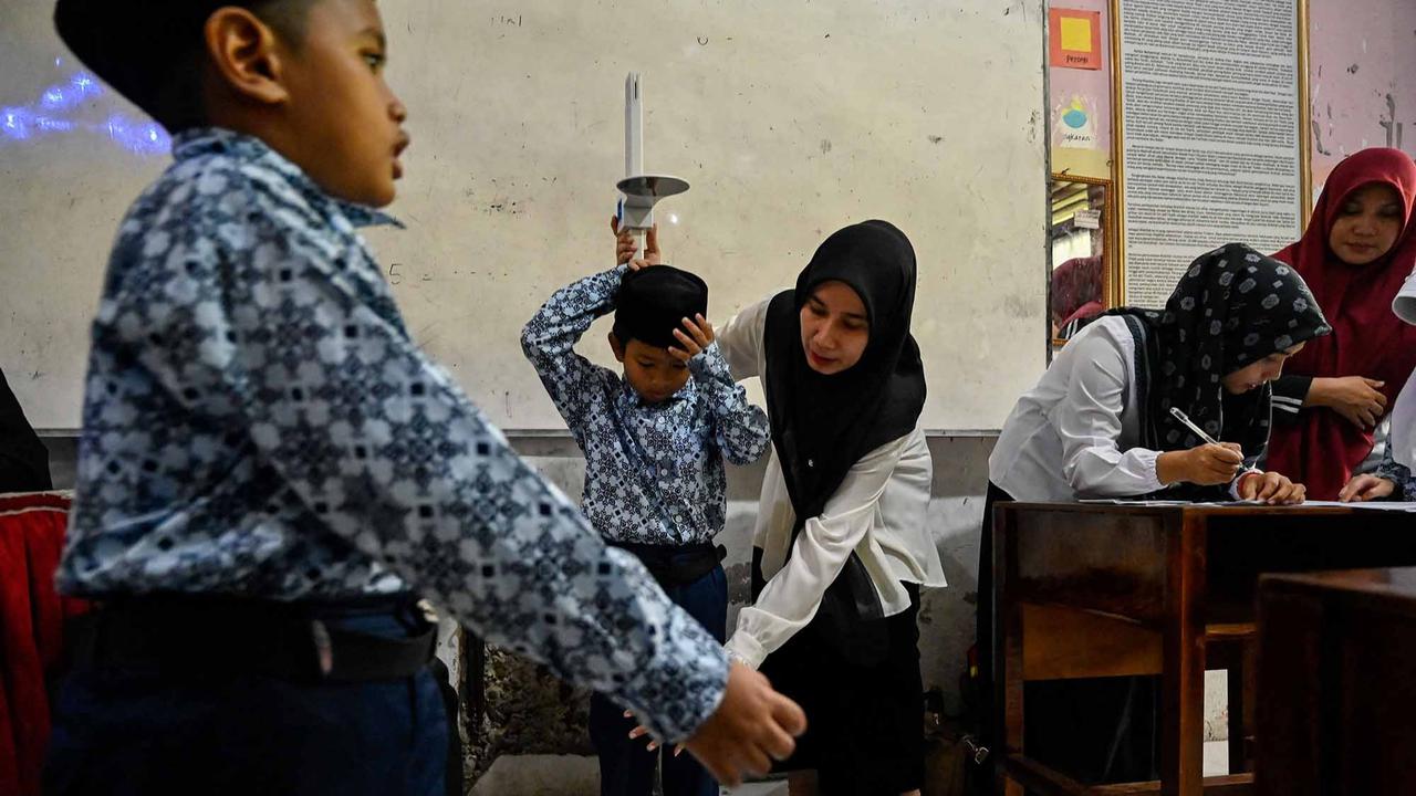 FOTO: Antusias Murid Madrasah Jalani Pemeriksaan Kesehatan Gratis