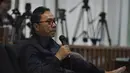 Ketua MPR, Zulkifli Hasan saat bersaksi untuk terdakwa Gulat Medali Emas Manurung di Pengadilan Tipikor, Jakarta, Senin (5/1/2015). (Liputan6.com/Miftahul Hayat)