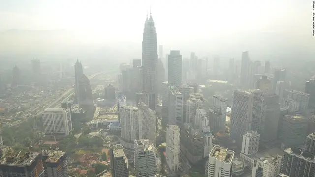 News Flash : Asap dari Riau Mulai Selimuti Malaysia dan Singapura