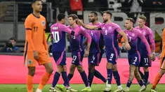 Penyerang Jerman, Niclas Fullkrug (ketiga kanan) merayakan gol bersama dengan rekan setimnya dalam pertandingan sepak bola persahabatan melawa Belanda di Frankfurt, Jerman, pada 26 Maret 2024. (INA FASSBENDER/AFP)