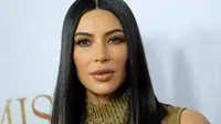 Kim Kardashian menginginkan anak ketiga. Waktunya lahir sudah dekat, rahim penggantinya pun itu bisa melahirkan kapapun. (CHRIS DELMAS  AFP)