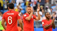 Eric Dier (tengah) ikut bahagia setelah membantu Inggris lolos ke semifinal Piala Dunia 2018. (Yuri CORTEZ / AFP)