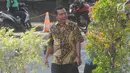 Mantan Kasatker SPAM Jambi Noftiman Nasir usai menjalani pemeriksaan oleh penyidik di Gedung KPK, Jakarta, Jumat (8/3). Noftiman diperiksa sebagai saksi untuk tersangka Anggiat Partunggul Nahot Simaremare. (merdeka.com/dwi narwoko)