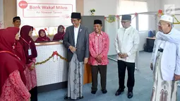Suasana saat Presiden Joko Widodo atau Jokowi meresmikan Bank Wakaf Mikro di Serang, Banten, Rabu (14/3). Bank Wakaf Mikro memberi pinjaman maksimal Rp 3 juta dan biaya administrasi tiga persen. (Liputan6.com/Pool/Biro Setpres)
