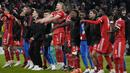 <p>Para pemain Bayern Munchen melakukan selebrasi usai bertanding melawan PSG pada pertandingan leg 2 babak 16 besar Liga Champions di Allianz Arena di Munich, Jerman, Kamis (9/3/2023). Bayern menang atas PSG dengan 2-0. (AP Photo/Matthias Schrader)</p>