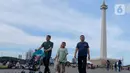 Selama momen libur Lebaran 2025 kawasan Monumen Nasional dibuka untuk umum mulai pukul 06.00 hingga 22.00 WIB. (Liputan6.com/Herman Zakharia)