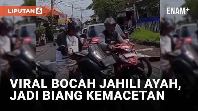 Tingkah jahil anak begitu sulit ditebak, termasuk oleh ayah di Bali berikut. Sang anak yang duduk di depan motor justru menjadi biang kemacetan. Bocah tersebut mematikan kontak motor saat menyeberang.