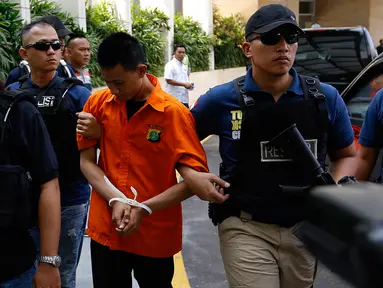 Polda Metro Jaya menggelar rekonstruksi pembunuhan warga negara Jepang, Yoshimi Nishimura, yang ditemukan tewas di Apartemen Casa Grande, Kasablanka, Tebet, Jakarta, Senin (14/9/2015). (Liputan6.com/Yoppy Renato)