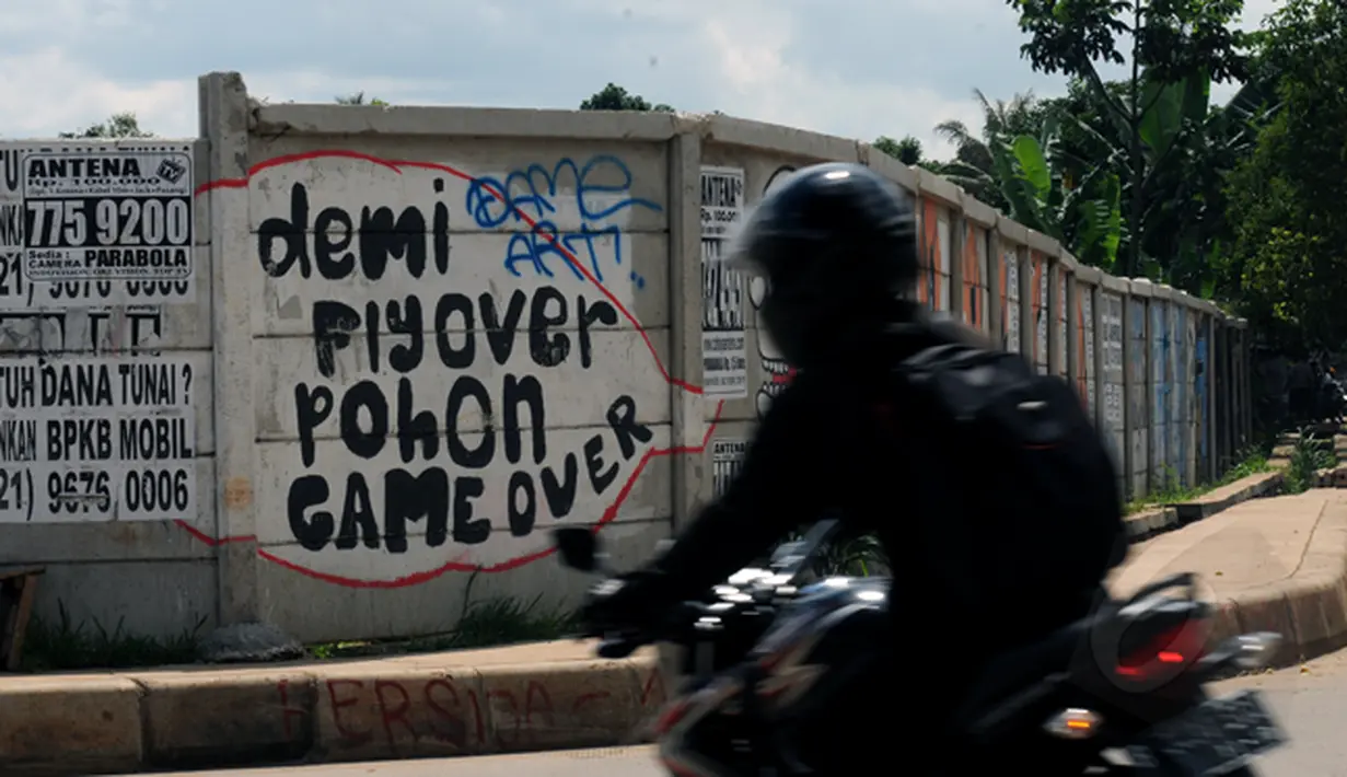 Salah satu pesan bernada satire dilukiskan di tembok pembatas yang ada di Jalan Juanda, Depok, Jawa Barat. Foto diambil pada Senin (2/3/2015). (Liputan6.com/Helmi Fithriansyah)