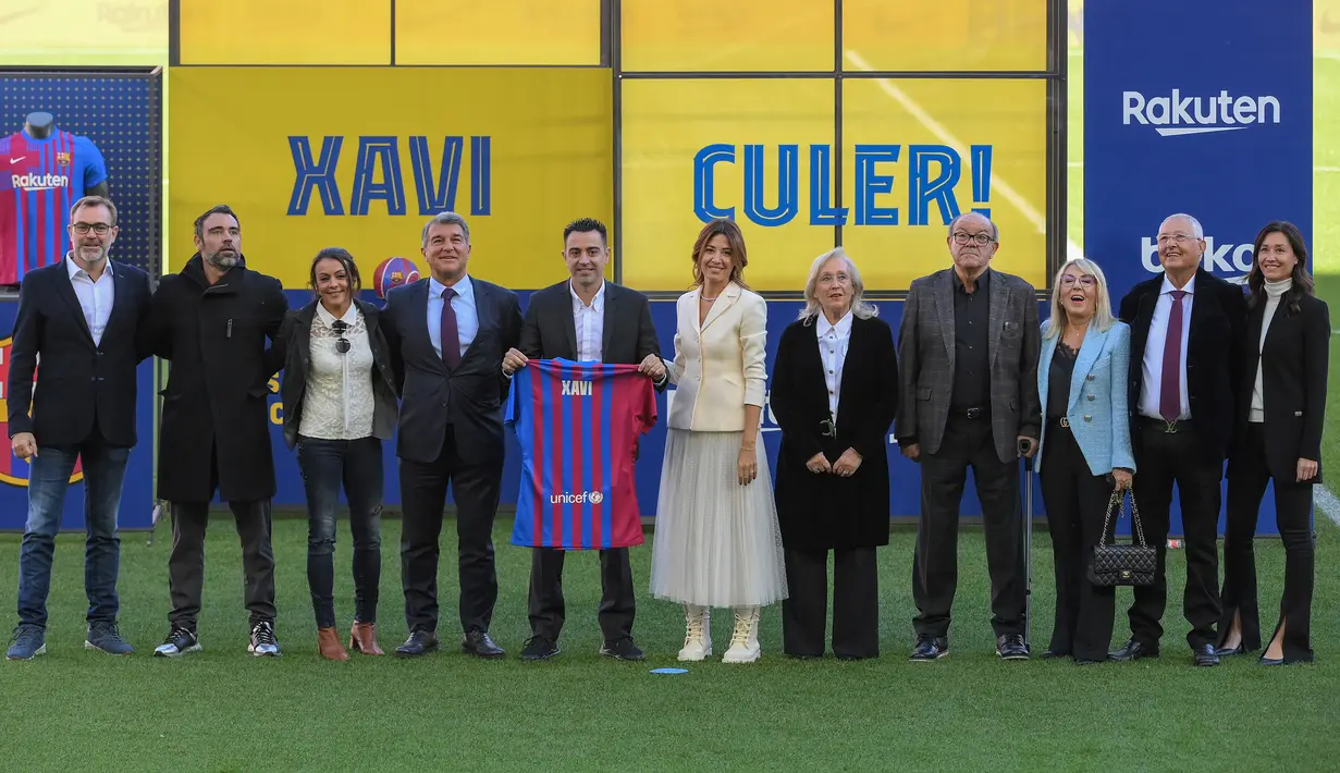 Dalam sambutannya, Xavi Hernandez membakar semangat para fans bahwa Barcelona tidak boleh kalah, dan ia akan berjuang memenangi tiap laga bersama Barca. (AFP/Lluis Gene)