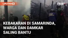 Petugas damkar dan relawan gabungan memadamkan kebakaran di Samarinda. Asap putih terlihat di sebuah area perumahan pada Selasa (15/10/2024)