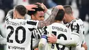 Gelandang Juventus, Weston McKennie merayakan dengan rekan satu timnya setelah mencetak gol ke gawang Udines pada pertandingan lanjutan Liga Serie A Italia di Allianz Stadium di Turin, Minggu (16/1/2022). Juventus menang atas Udinese 2-2. (AFP/ Isabella Bonotto)