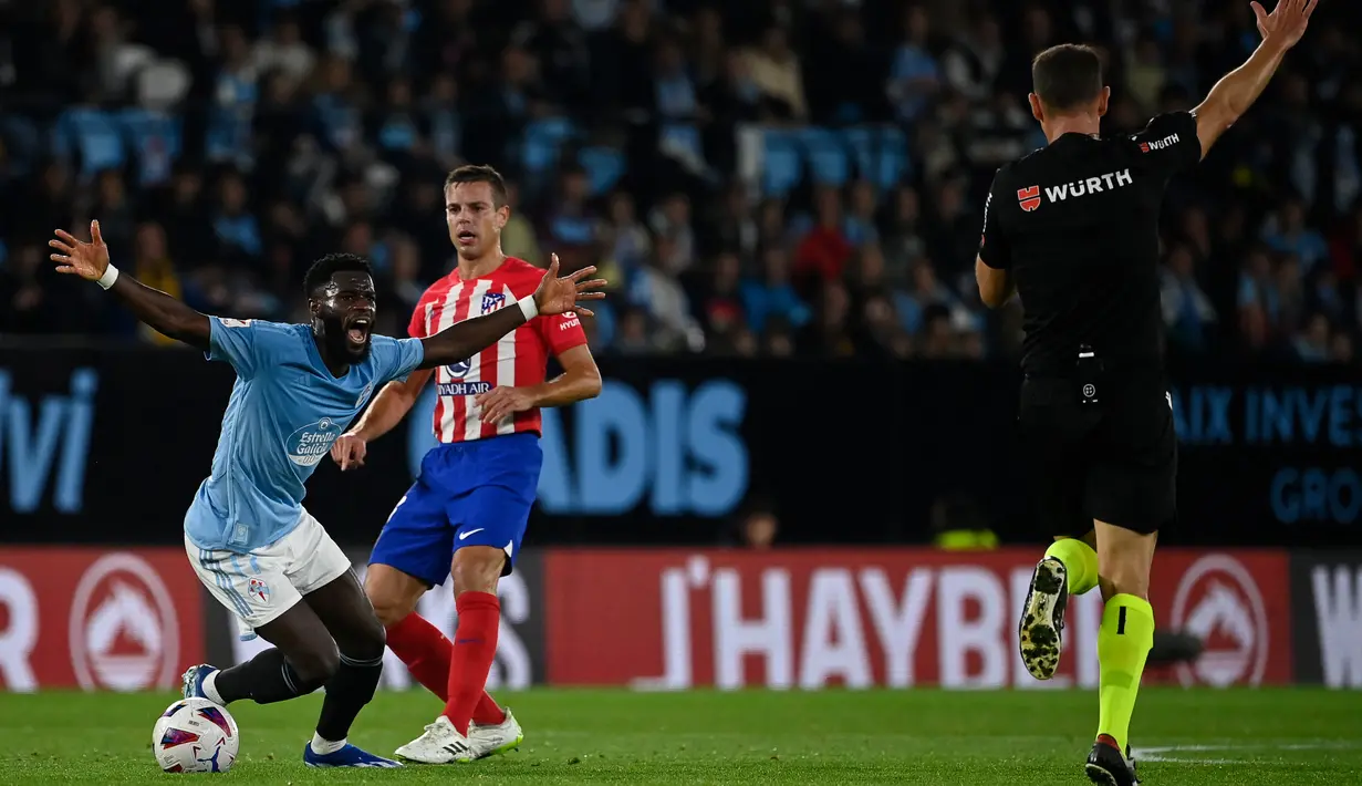 Hasil ini membawa Atletico naik ke urutan dua dengan 22 poin dari sembilan laga. (MIGUEL RIOPA / AFP)