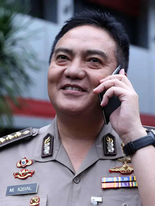 "Masih lama, bisa sampai malam," ucap salah satu petugas kepolisian di ruang Reserse Kriminal Khusus Polda Metro Jaya, Rabu (30/3/2016). (Nurwayunan/Bintang.com)