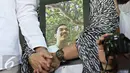Tampak bingkai foto Muhammad Ridzky Khalid anak pertama Presenter Farhan di TPU Tanah Kusir, Jakarta, Senin (21/12). ). Ridzky menghebuskan nafas terakhirnya akibat penyakit leukimia. (Liputan6.com/Immanuel Antonius)